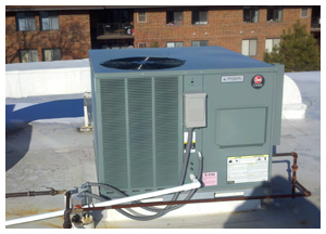 Apartment building air conditioning unit installation on rooftop